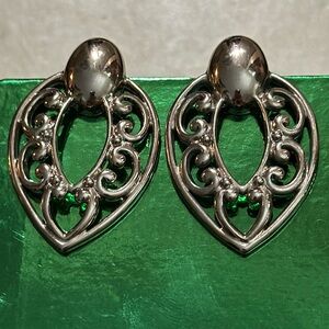 Avon Dramatic Doorknock-like Silver Earrings